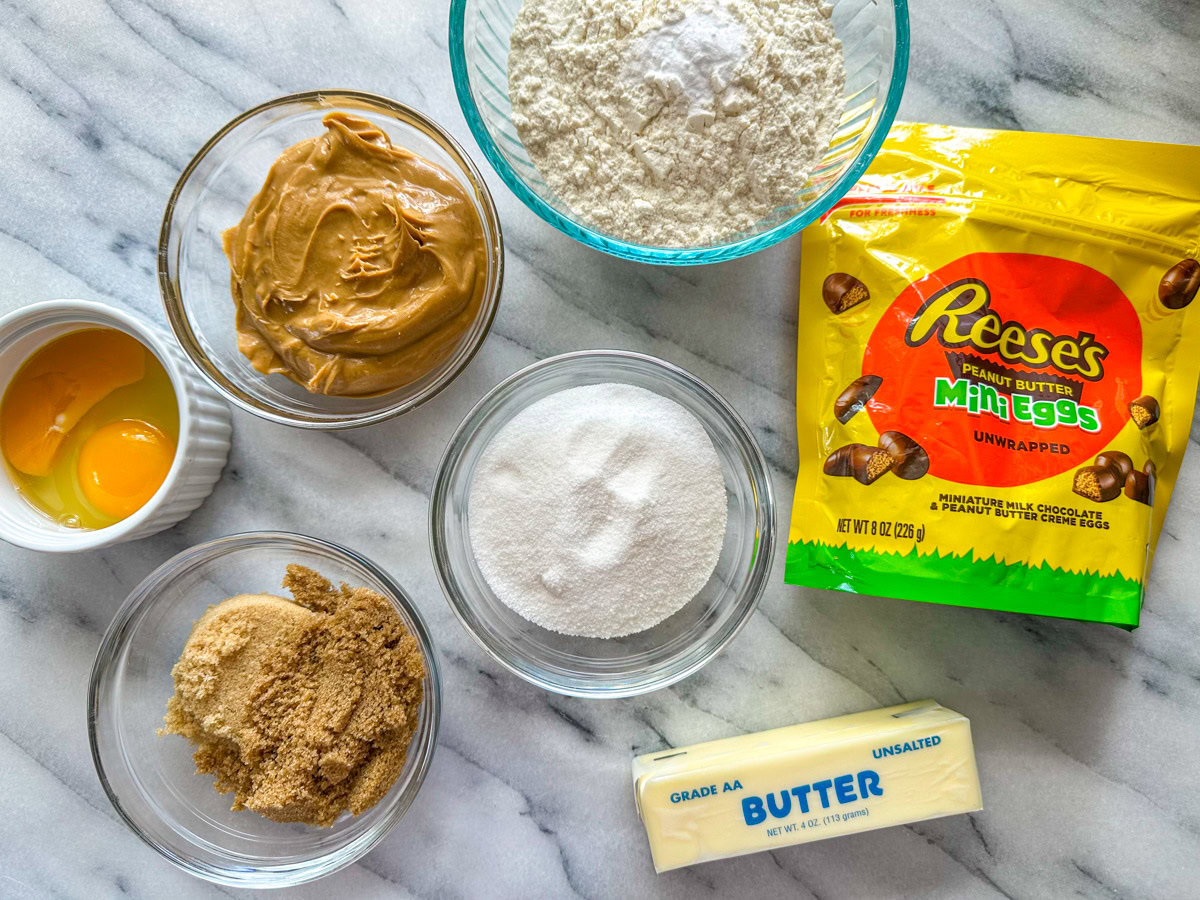 Bowls of ingredients to make Reese's Mini Egg Peanut Butter Cookies. 