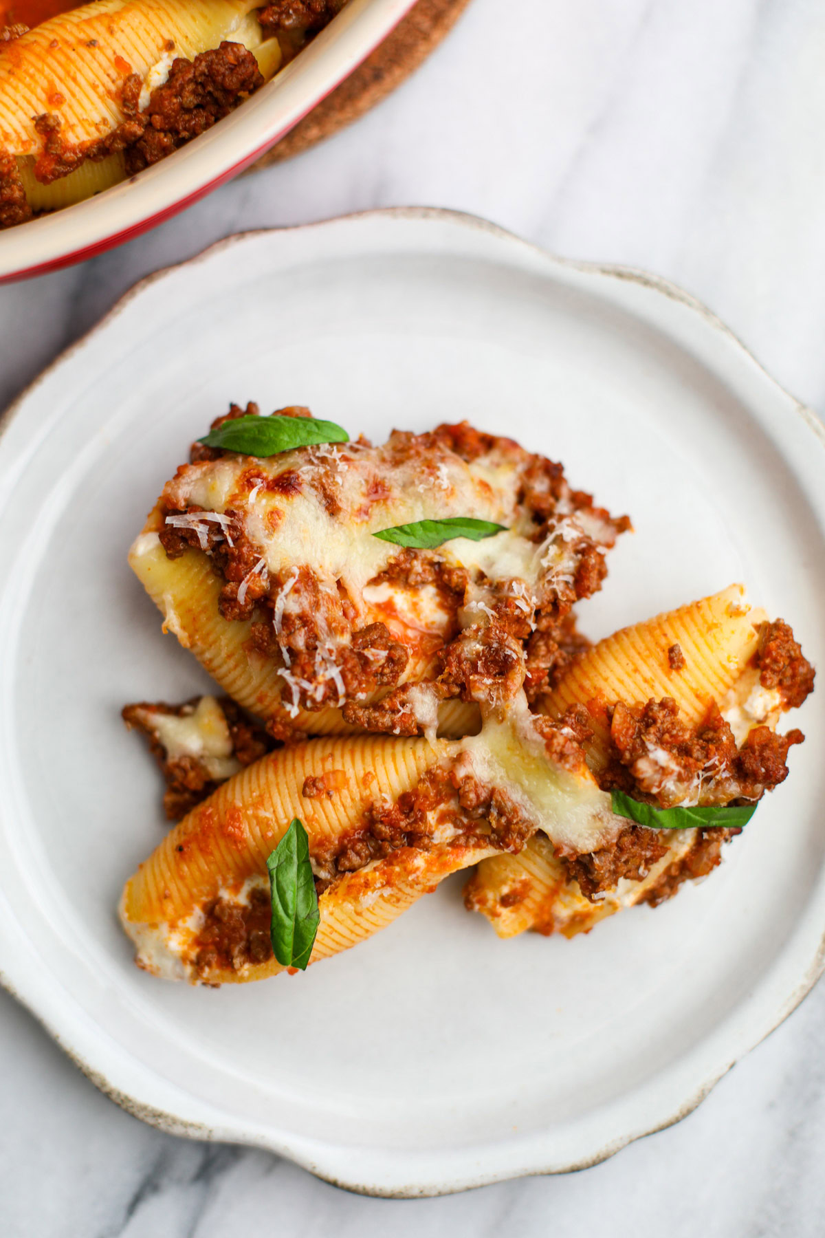 A closeup of three stuffed shells.