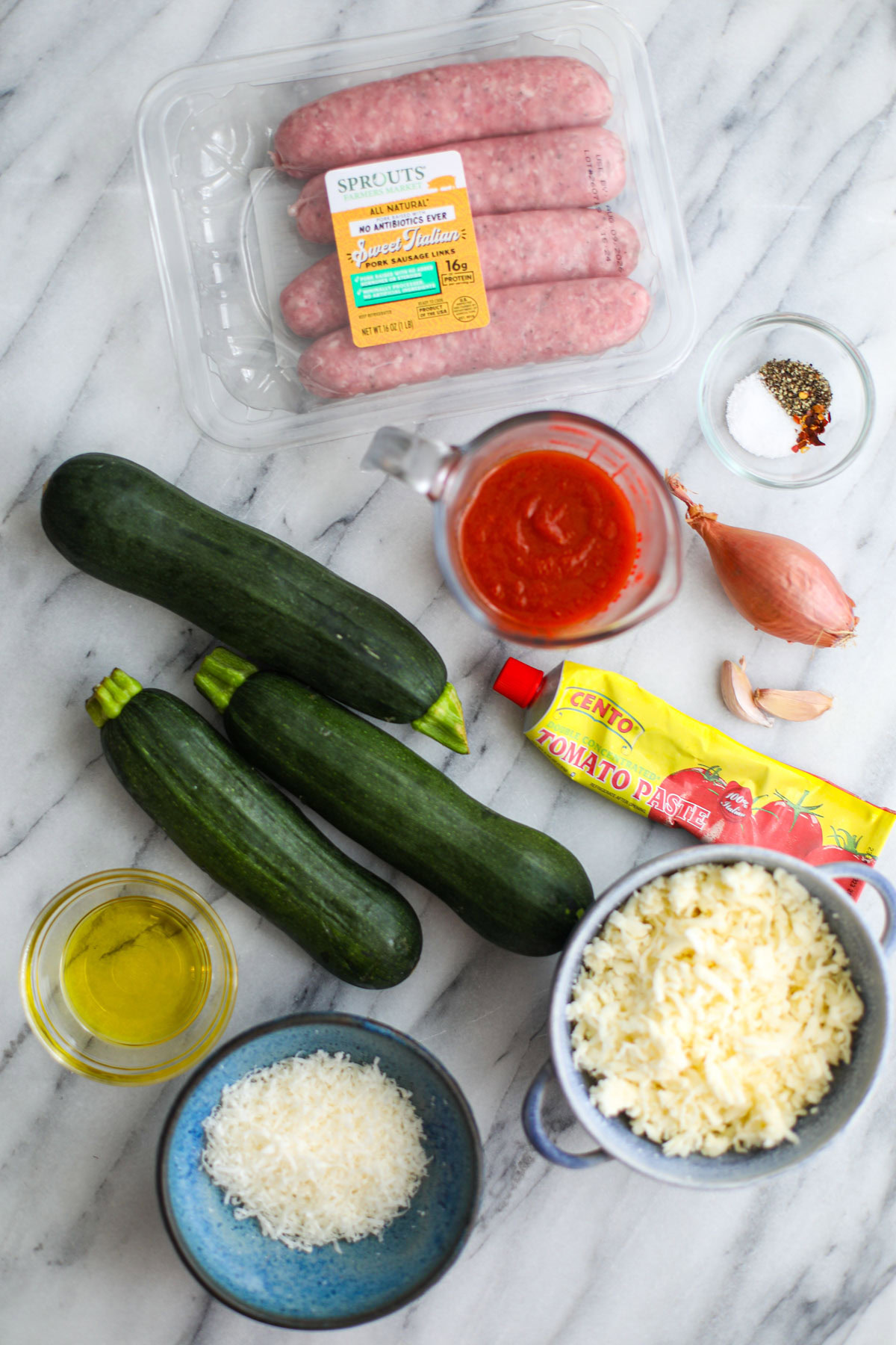 Ingredients to make sausage stuffed zucchini boats.
