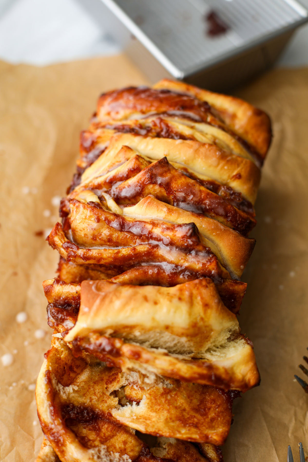 Apple butter pull apart loaf on parchment paper.