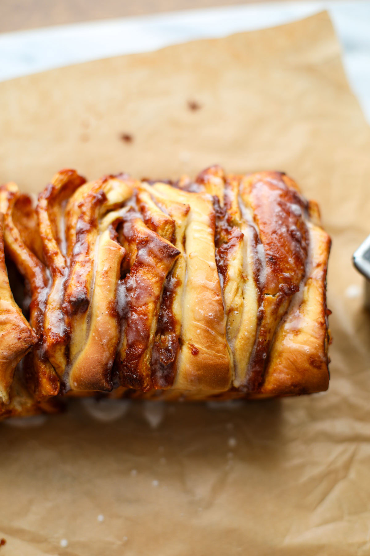 Apple butter pull apart loaf on parchment paper.