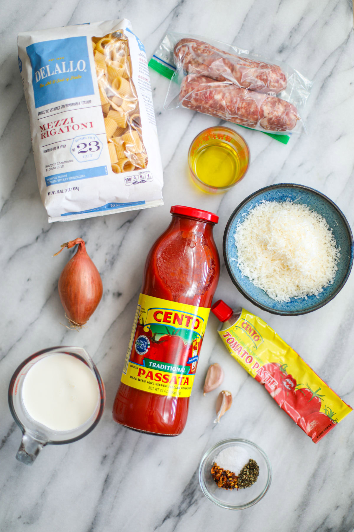 Ingredients to make creamy sausage rigatoni.